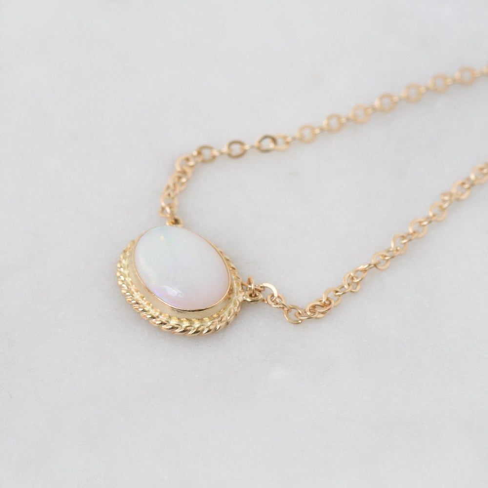 
                      
                        NKL-14K 14k Gold East West Bezel Set Opal Necklace
                      
                    