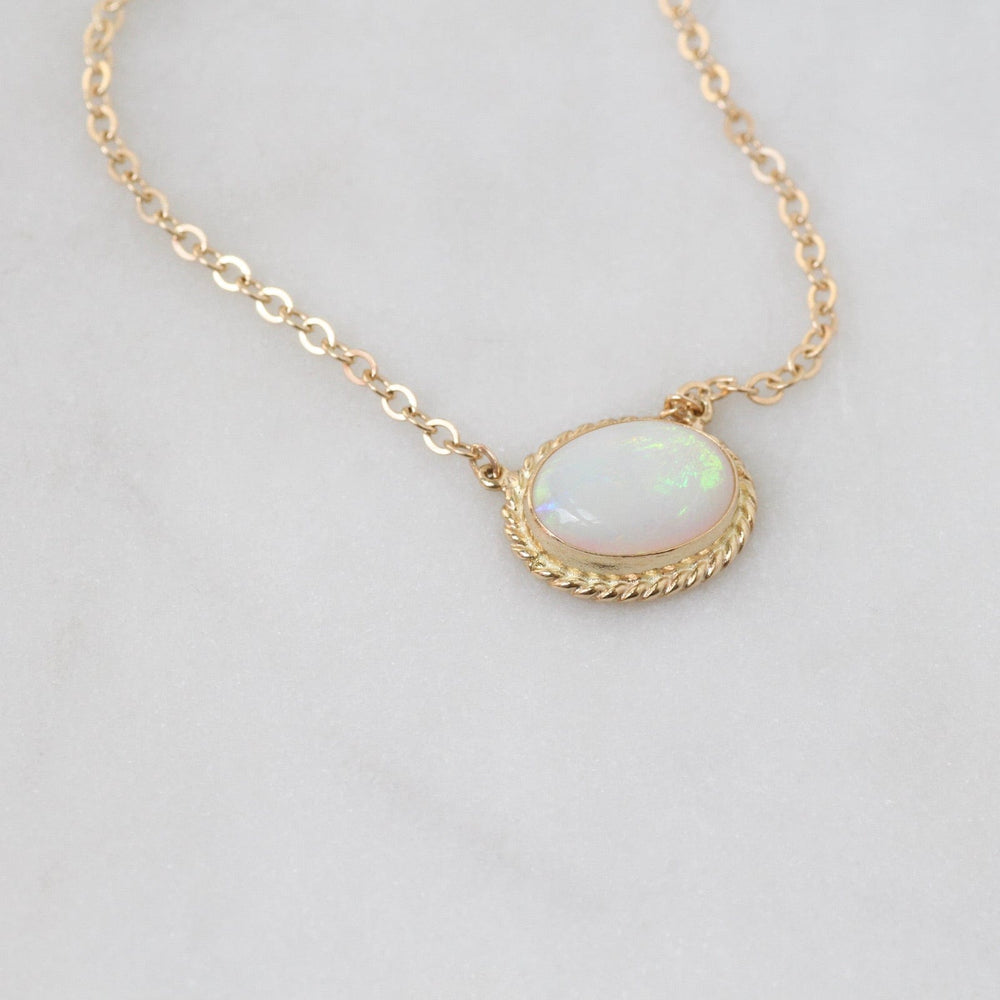 
                      
                        NKL-14K 14k Gold East West Bezel Set Opal Necklace
                      
                    