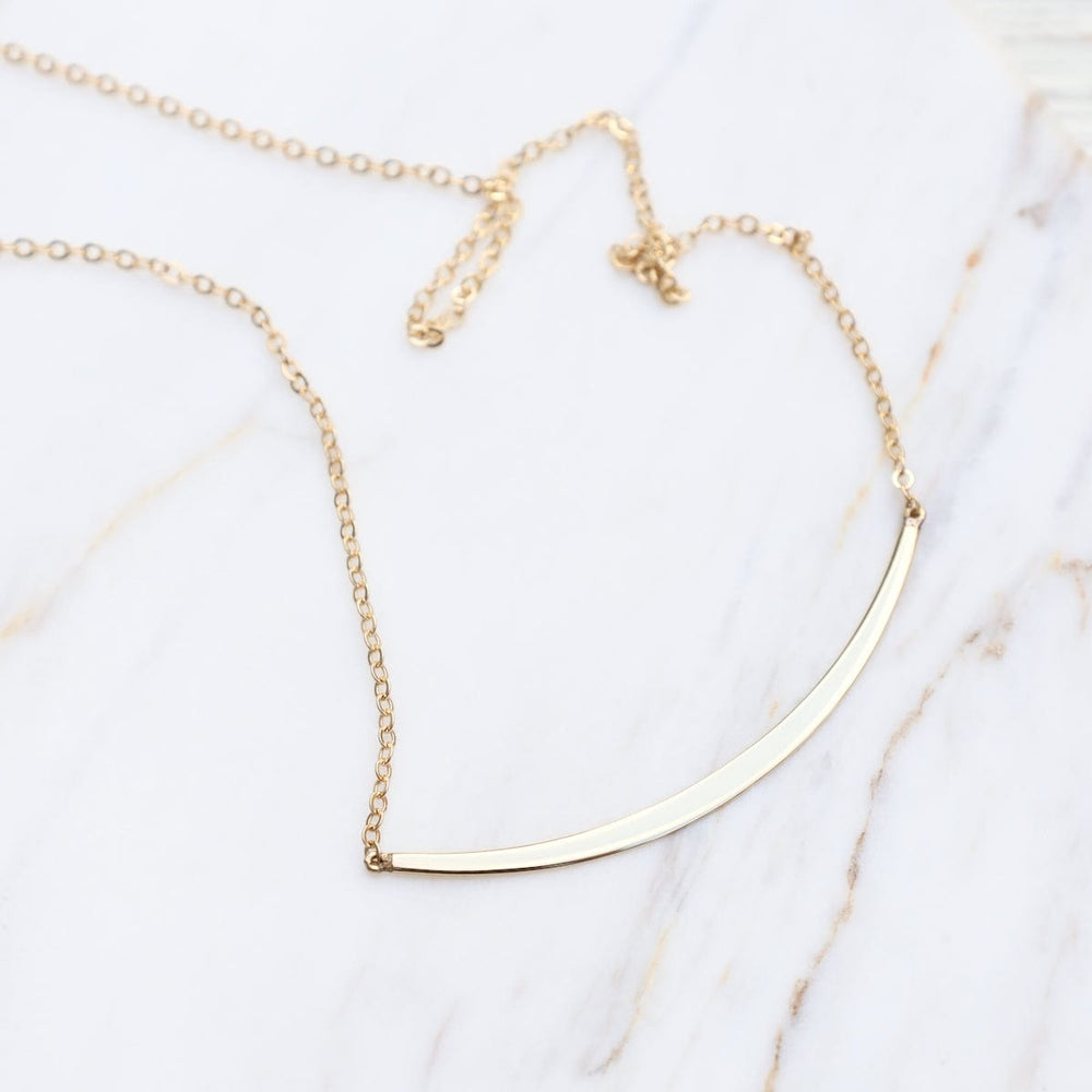 
                      
                        NKL-14K 14k Gold Half Curve Necklace
                      
                    