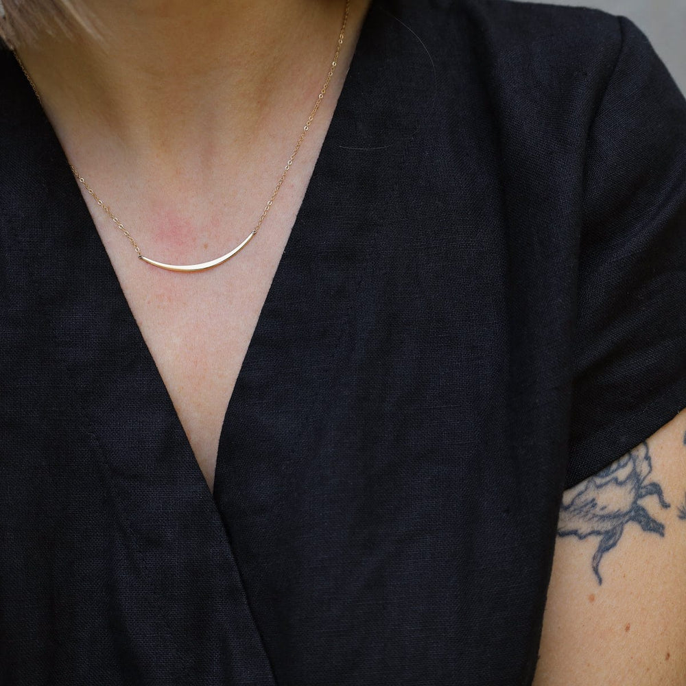 
                      
                        NKL-14K 14k Gold Half Curve Necklace
                      
                    