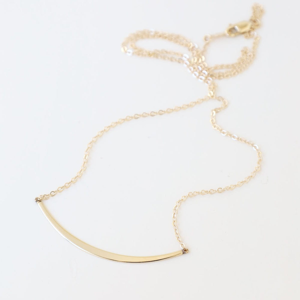 
                      
                        NKL-14K 14k Gold Half Curve Necklace
                      
                    