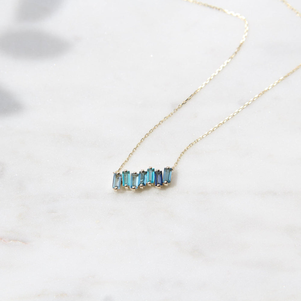 
                  
                    NKL-14K 14k Gold Mixed Blue Baguette Bar Necklace
                  
                