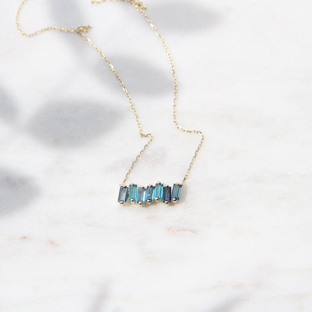 
                  
                    NKL-14K 14k Gold Mixed Blue Baguette Bar Necklace
                  
                