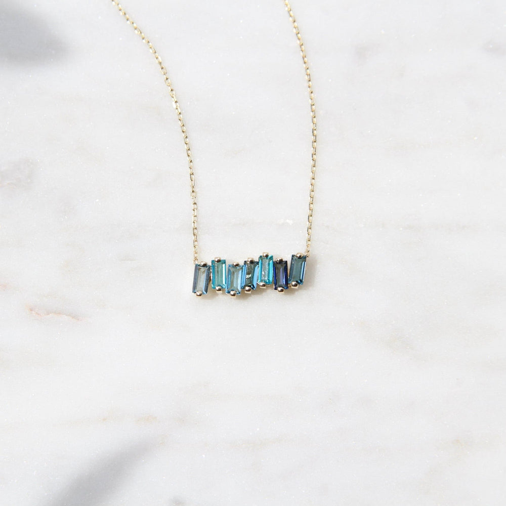 
                  
                    NKL-14K 14k Gold Mixed Blue Baguette Bar Necklace
                  
                