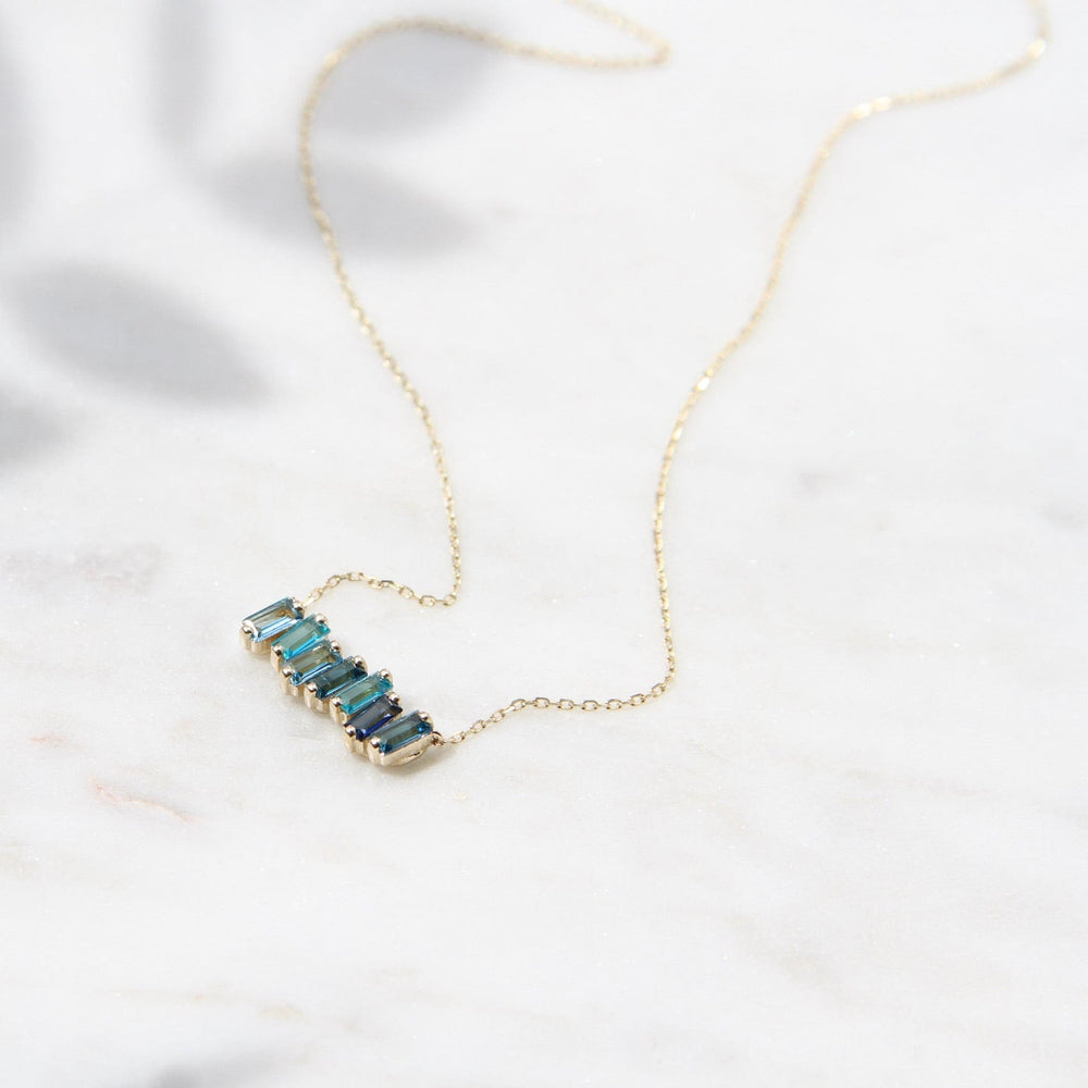 
                  
                    NKL-14K 14k Gold Mixed Blue Baguette Bar Necklace
                  
                