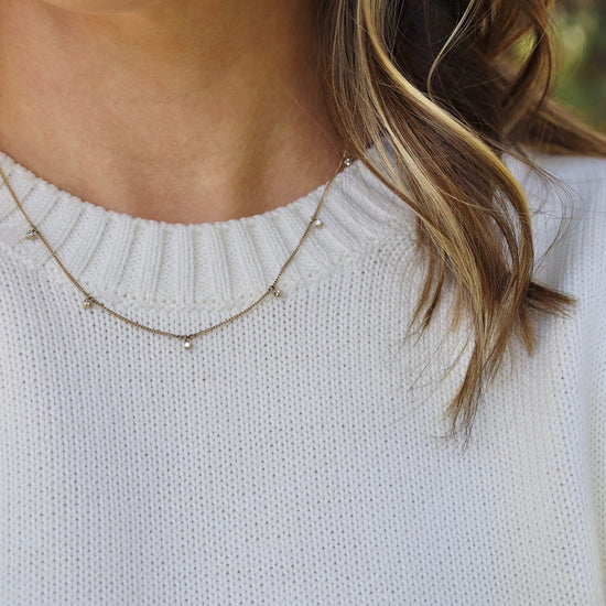 NKL-14K 14K Gold Necklace with Seven Sliding White Diamonds