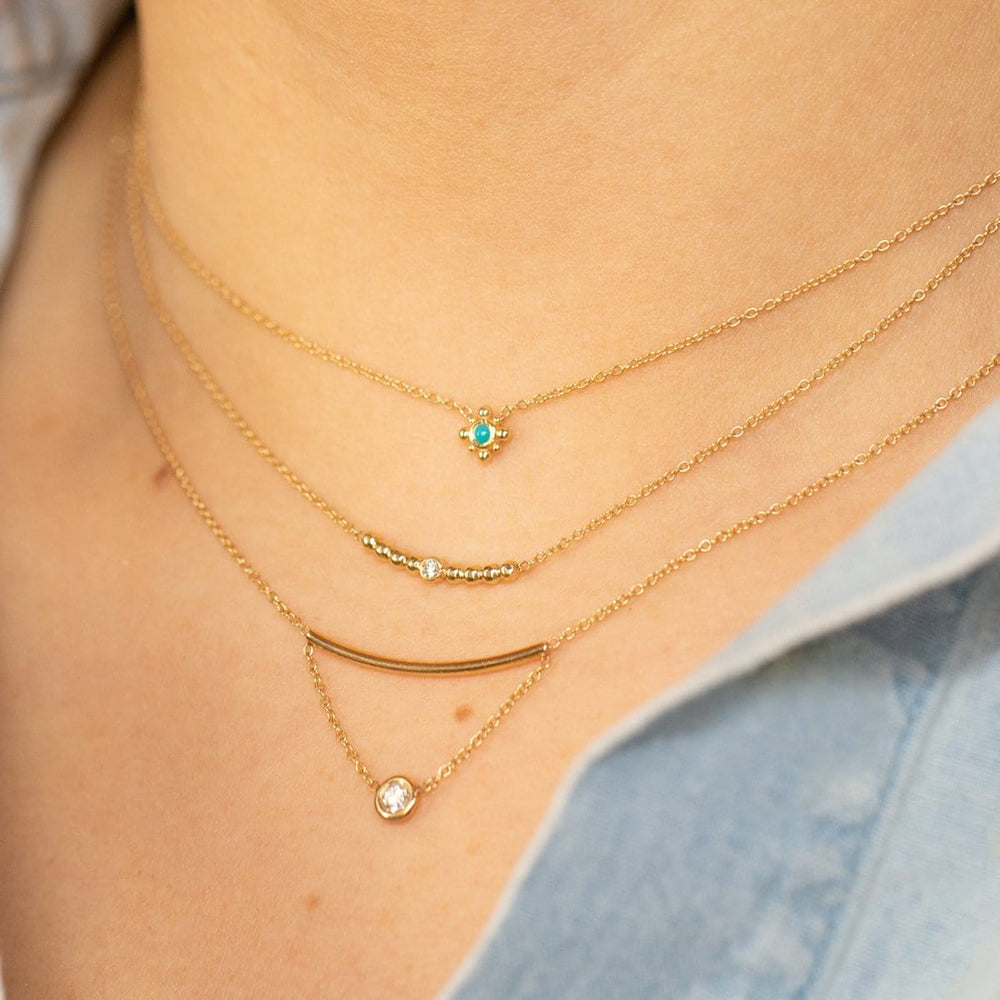 
                  
                    NKL-14K 14K Gold Tiny Bead Turquoise Starburst Necklace
                  
                