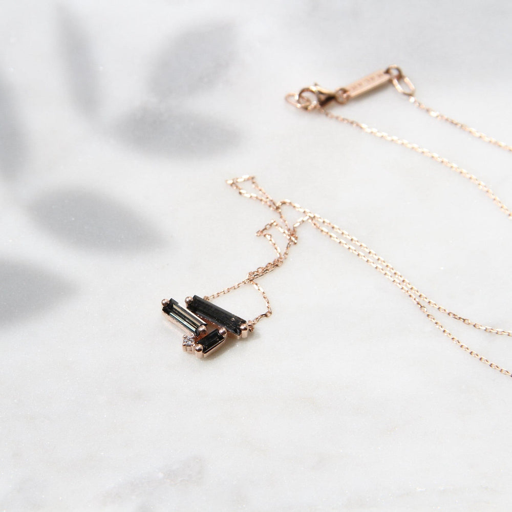 
                  
                    NKL-14K 14k Rose Gold Scattered Black Night Quartz Baguettes Necklace
                  
                