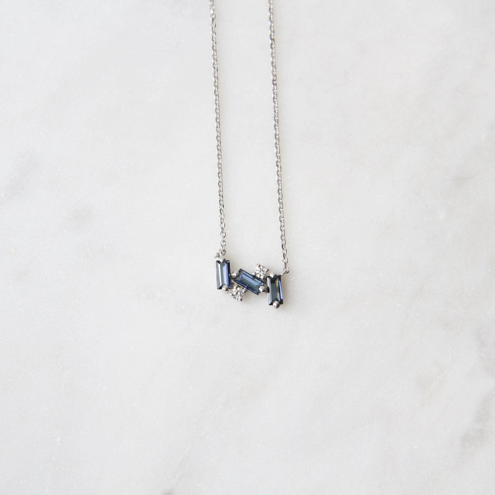 
                  
                    NKL-14K 14k White Gold English Blue Topaz Mini Bar Necklace
                  
                