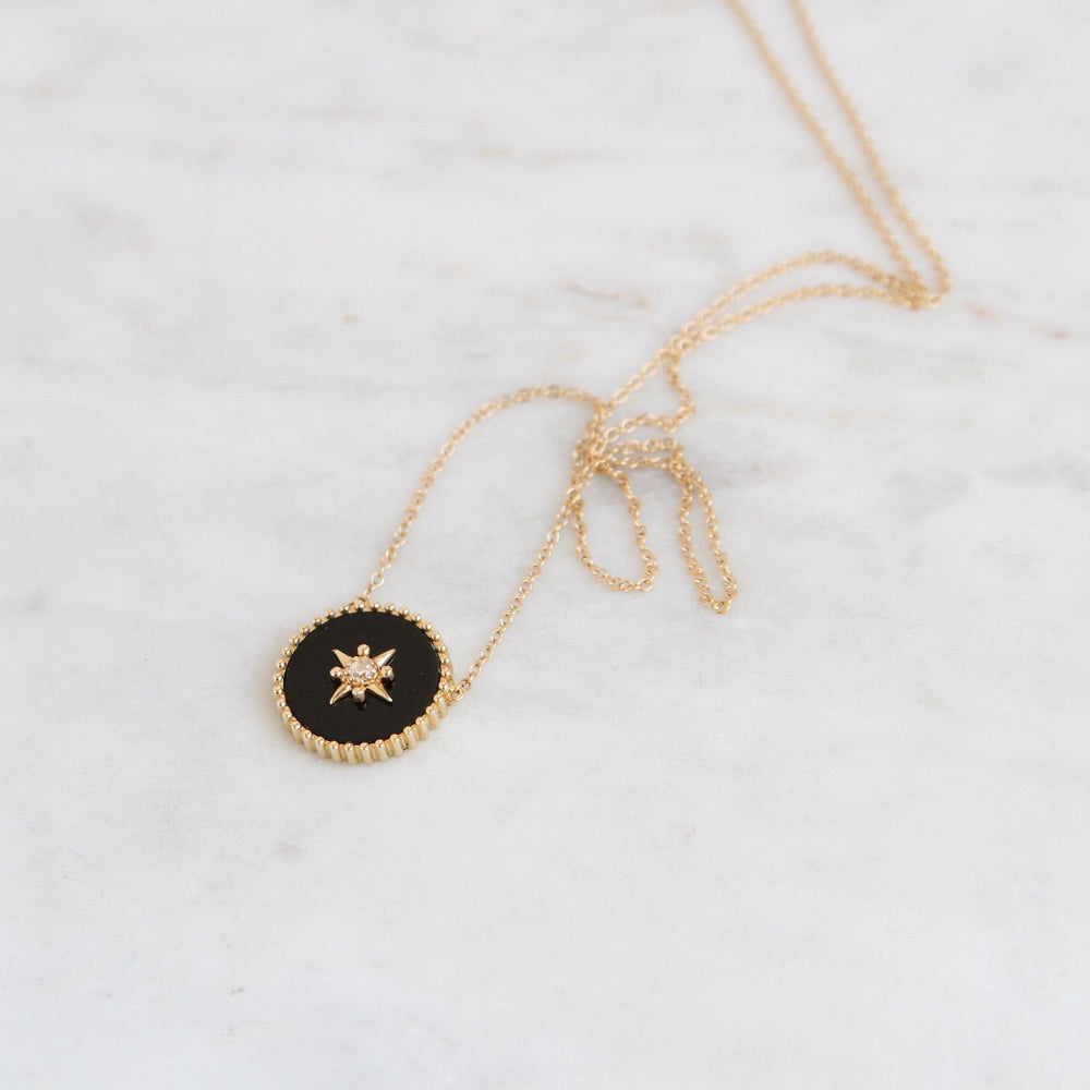 
                      
                        NKL-14K 14k Yellow Gold Black Onyx Disc with Gold Star & Diamond Center
                      
                    