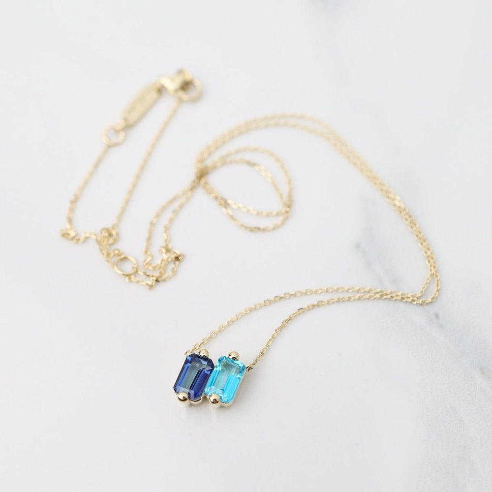 
                  
                    NKL-14K 14k Yellow Gold Blue Ombre Baguette Necklace
                  
                