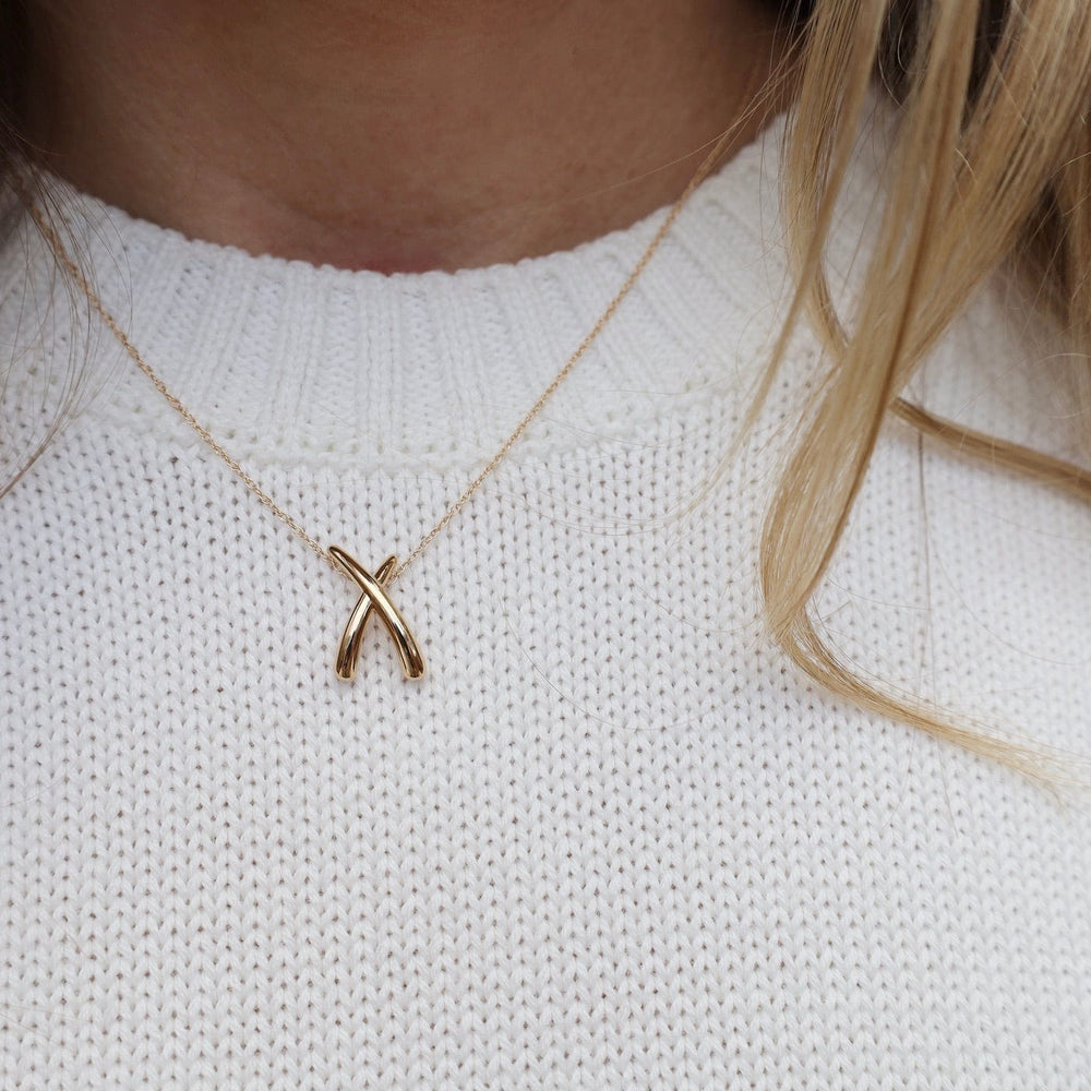 
                  
                    NKL-14K 14K Yellow Gold Medium "X" Necklace
                  
                