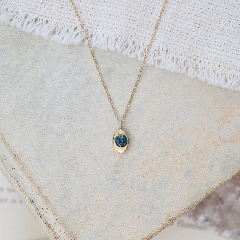 
                      
                        NKL-14K 14k Yellow Gold Montana Sapphire Oval Necklace
                      
                    