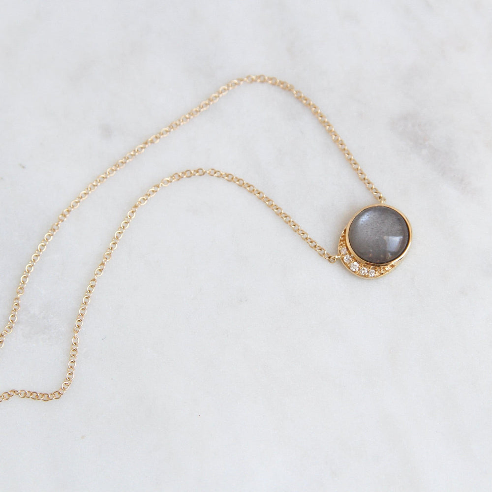 
                      
                        NKL-14K 14k Yellow Gold Moon Phase Necklace with Bezel Set Grey Moonstone
                      
                    