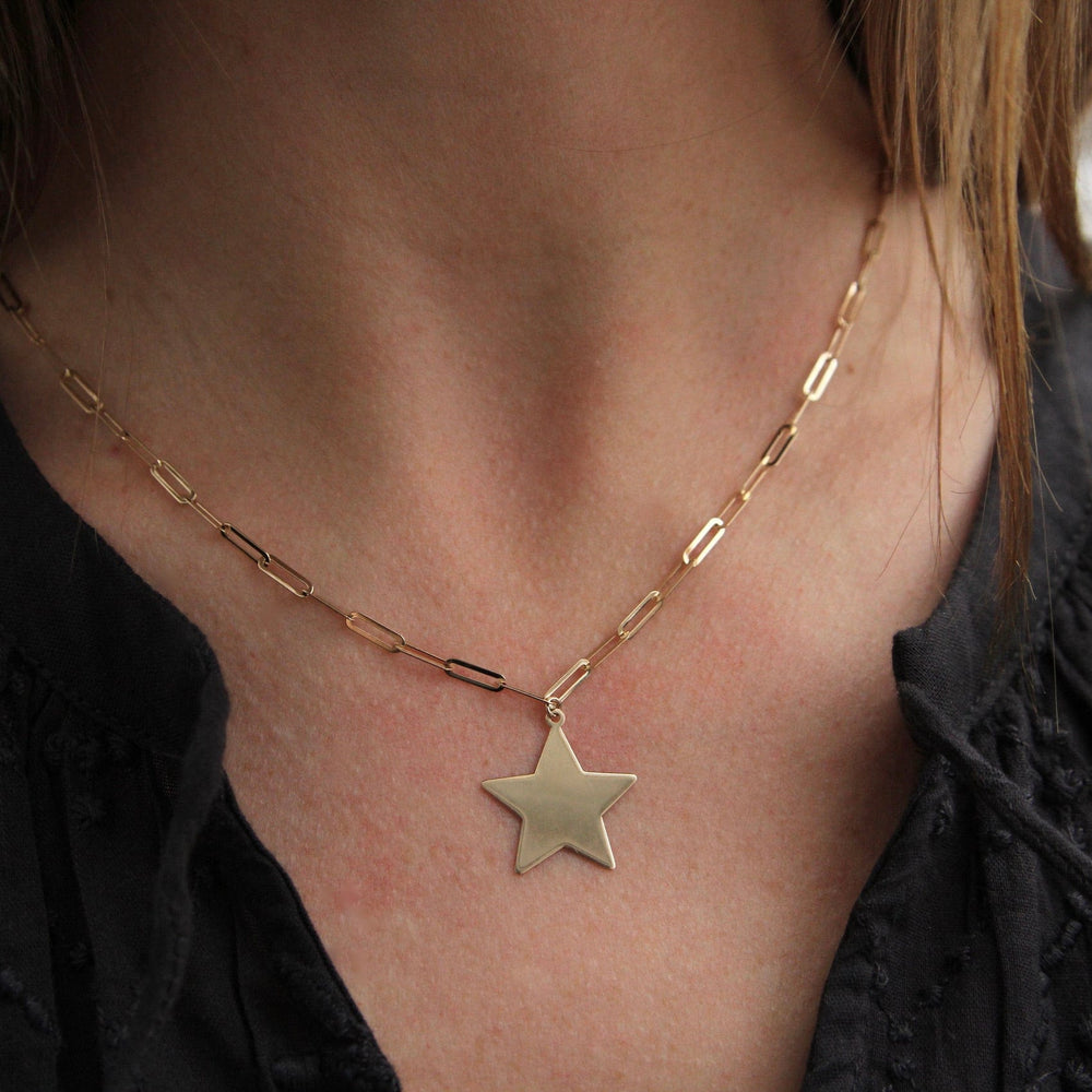 
                      
                        NKL-14K 14k Yellow Gold Paperclip Chain with Star Pendant
                      
                    