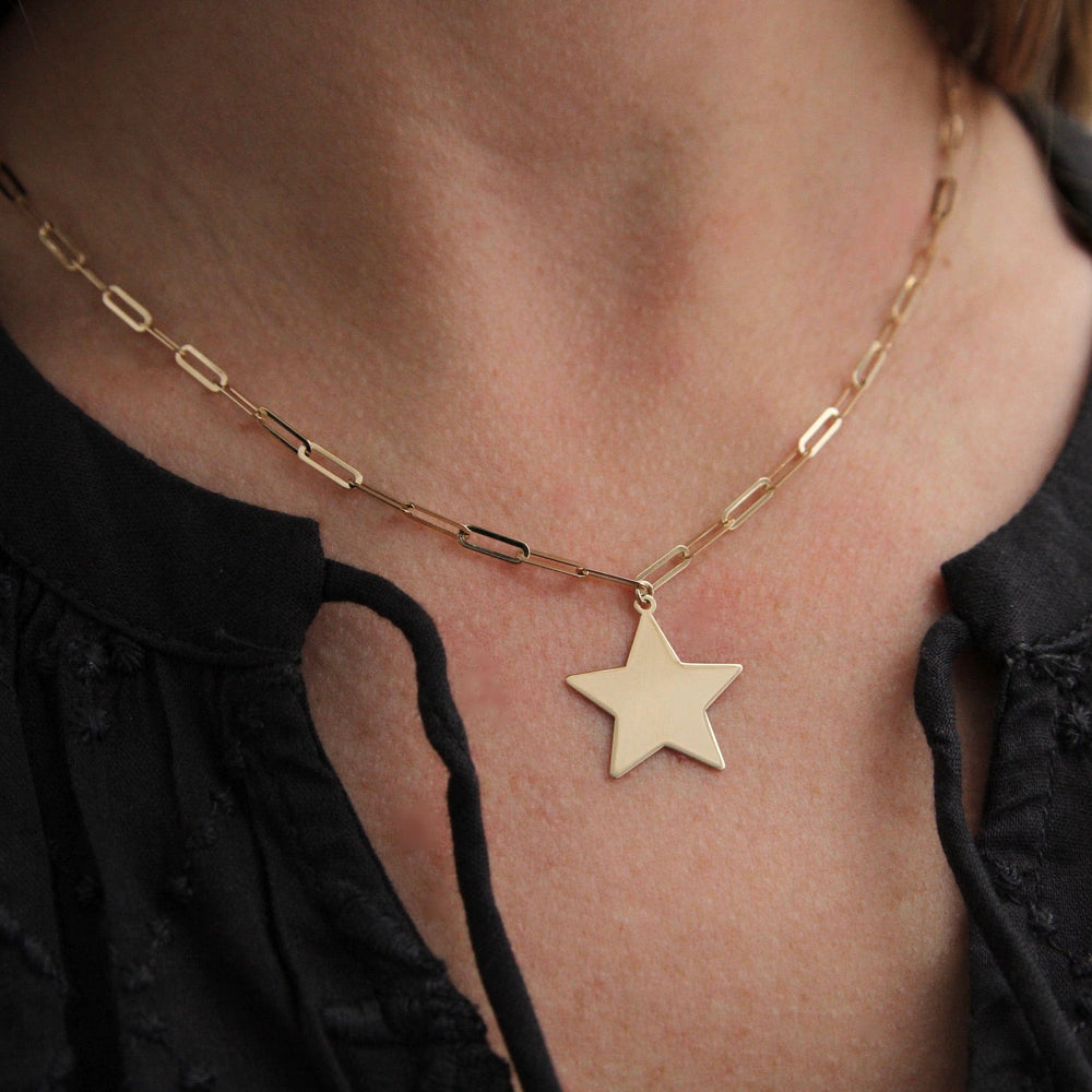 
                      
                        NKL-14K 14k Yellow Gold Paperclip Chain with Star Pendant
                      
                    