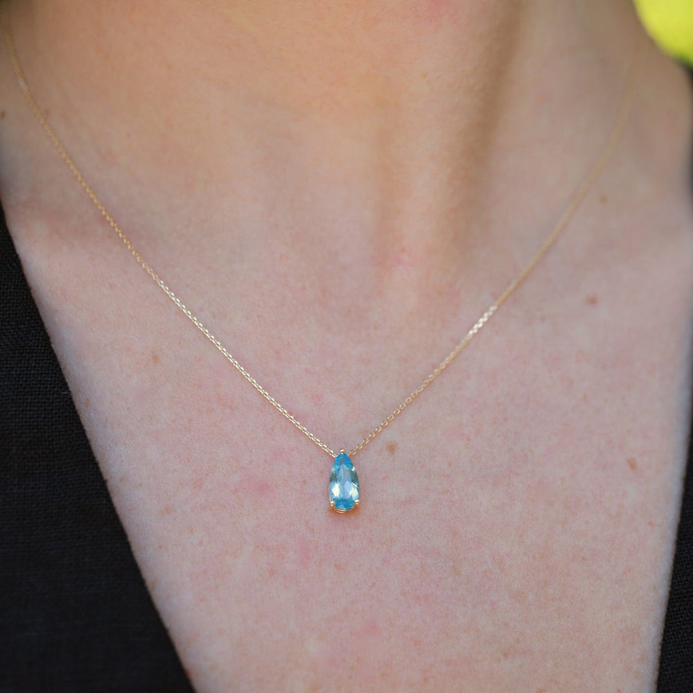 NKL-14K 14k Yellow Gold Pear Shaped Swiss Blue Topaz Necklace