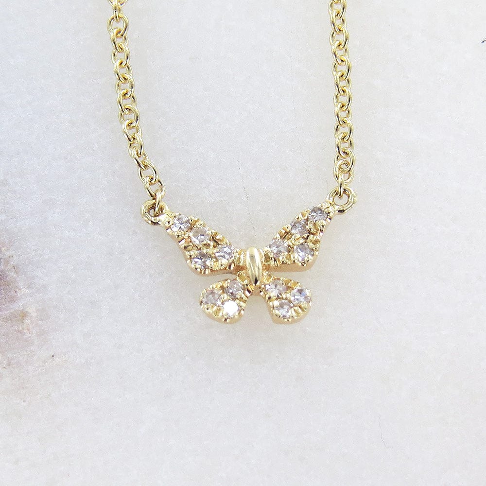 
                      
                        NKL-14K 14k Yellow Gold Petite Diamond Butterfly Necklace
                      
                    