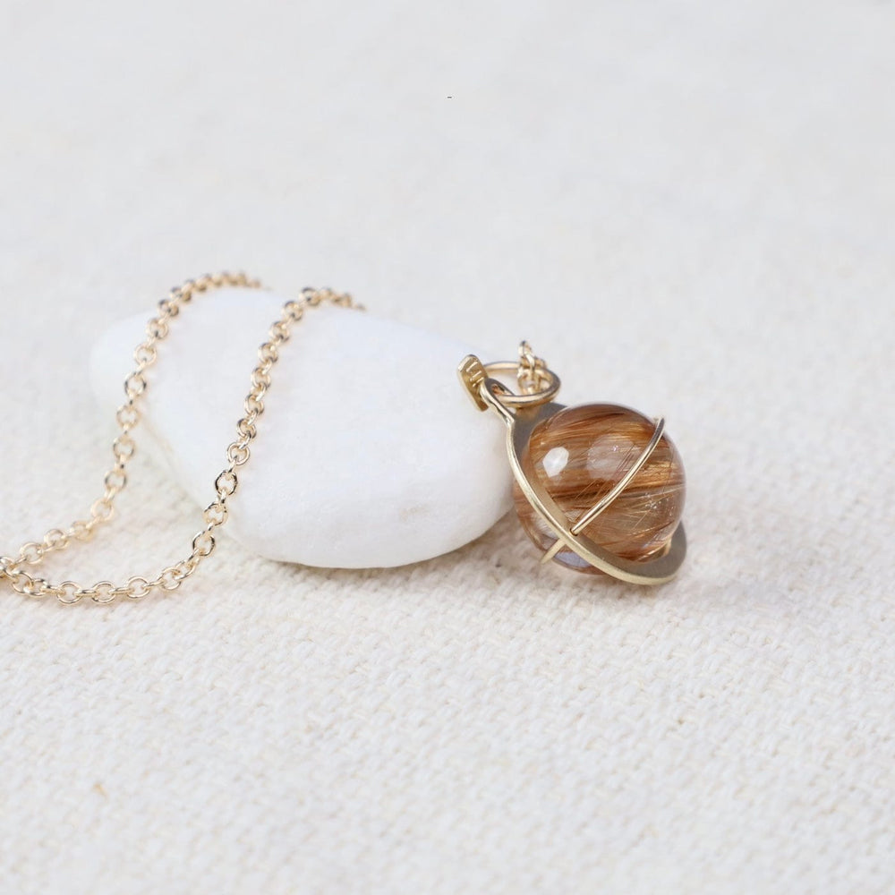 
                  
                    NKL-14K Captured Rutilated Quartz Orb Necklace
                  
                