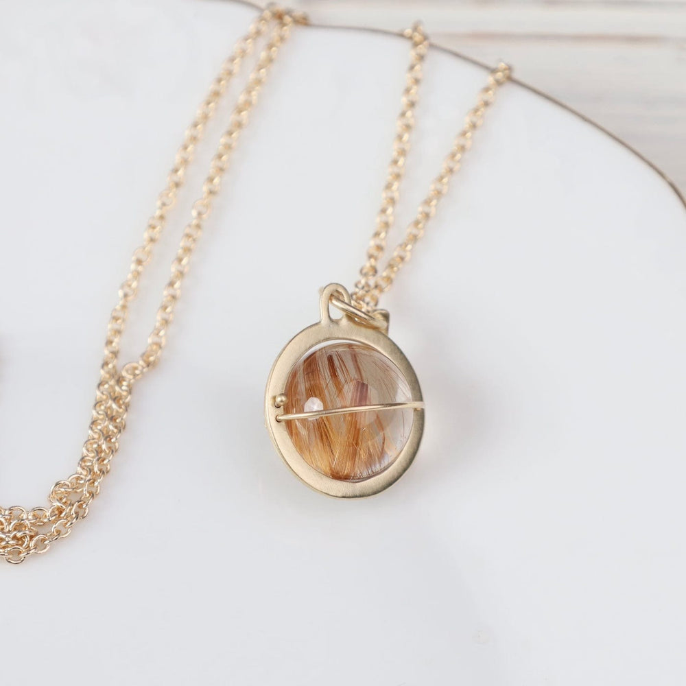 
                  
                    NKL-14K Captured Rutilated Quartz Orb Necklace
                  
                