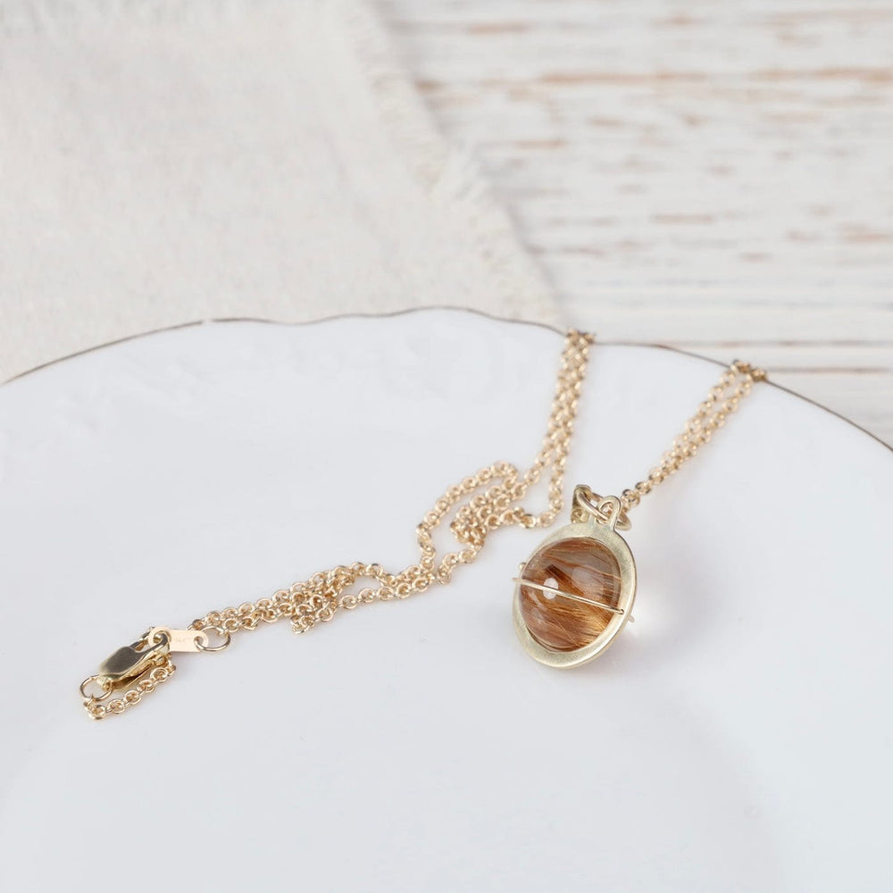 
                  
                    NKL-14K Captured Rutilated Quartz Orb Necklace
                  
                