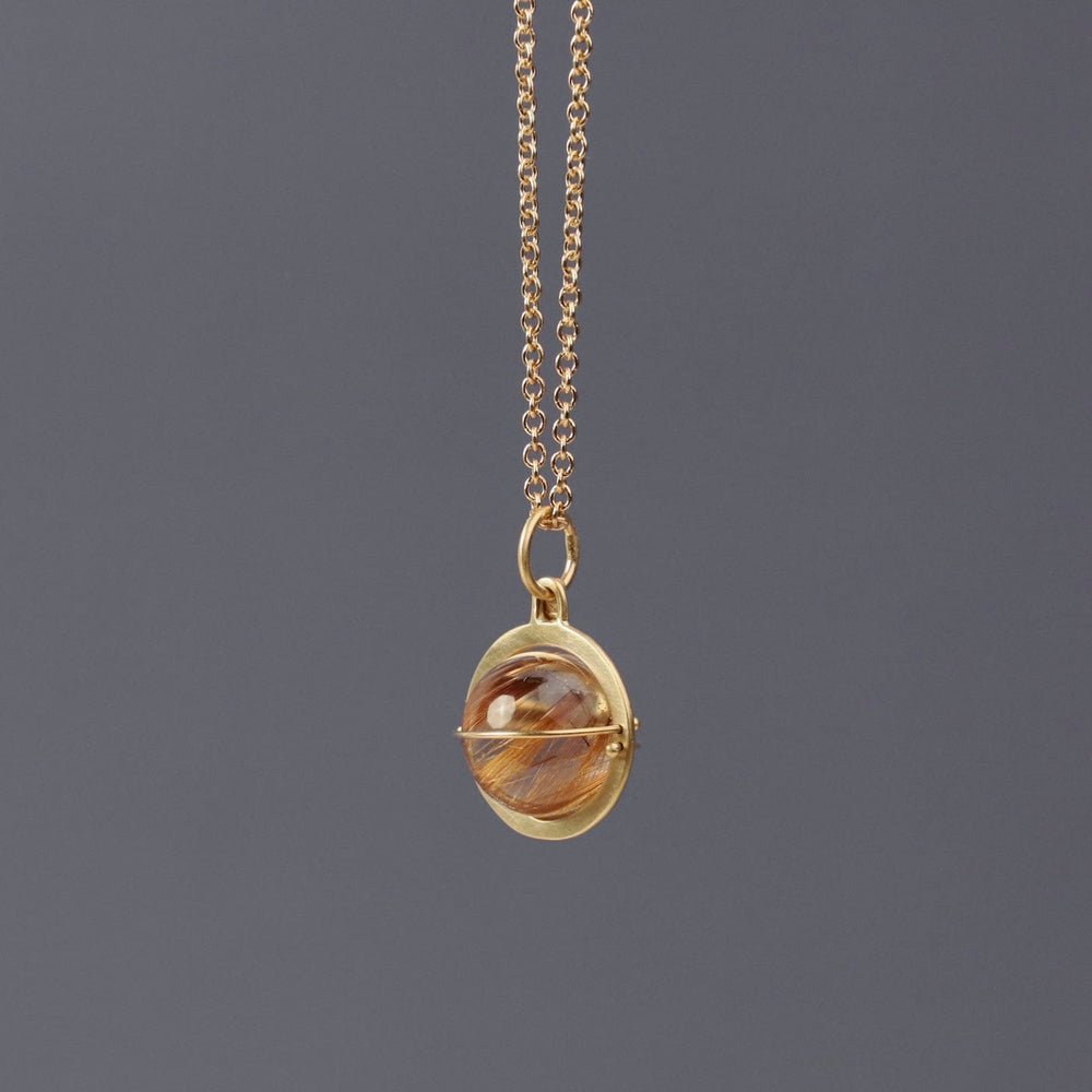 
                  
                    NKL-14K Captured Rutilated Quartz Orb Necklace
                  
                