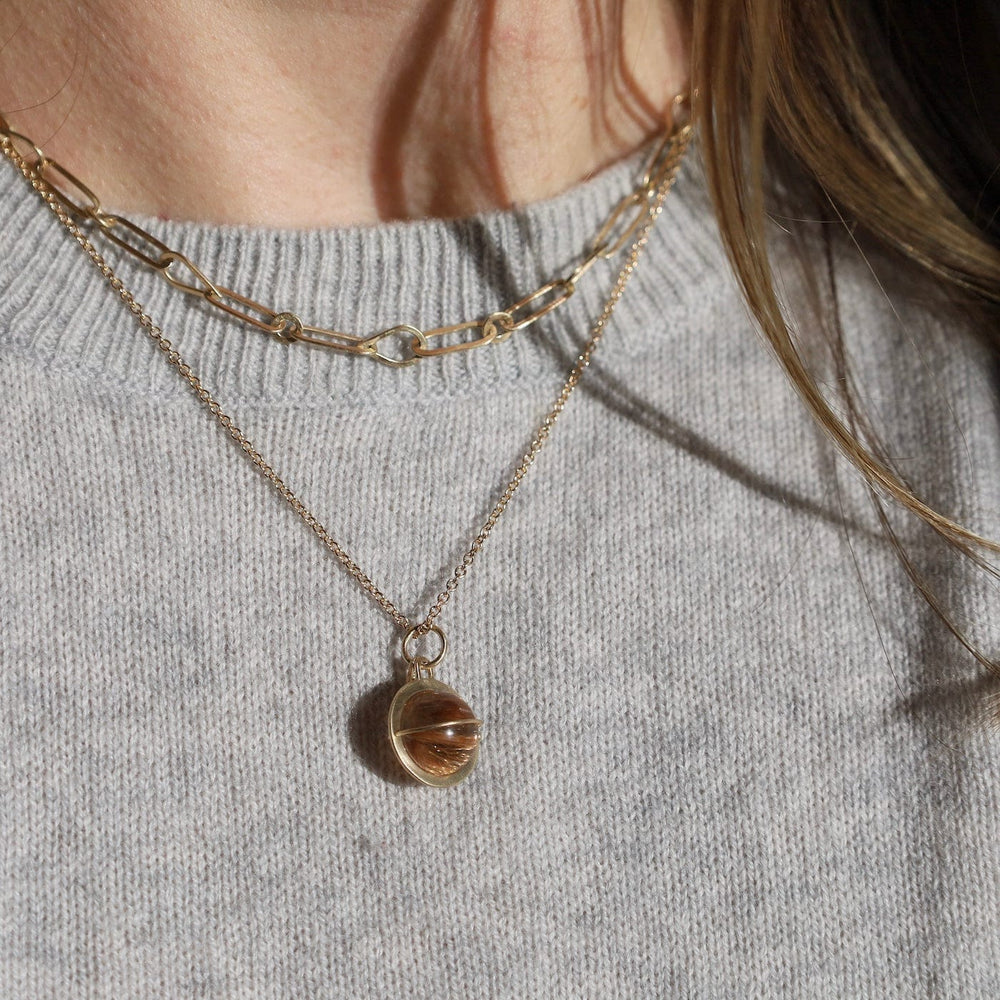 
                  
                    NKL-14K Captured Rutilated Quartz Orb Necklace
                  
                