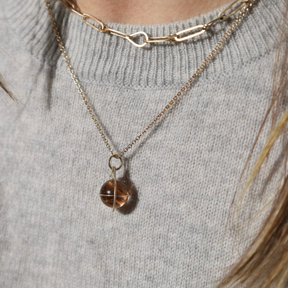 
                  
                    NKL-14K Captured Rutilated Quartz Orb Necklace
                  
                