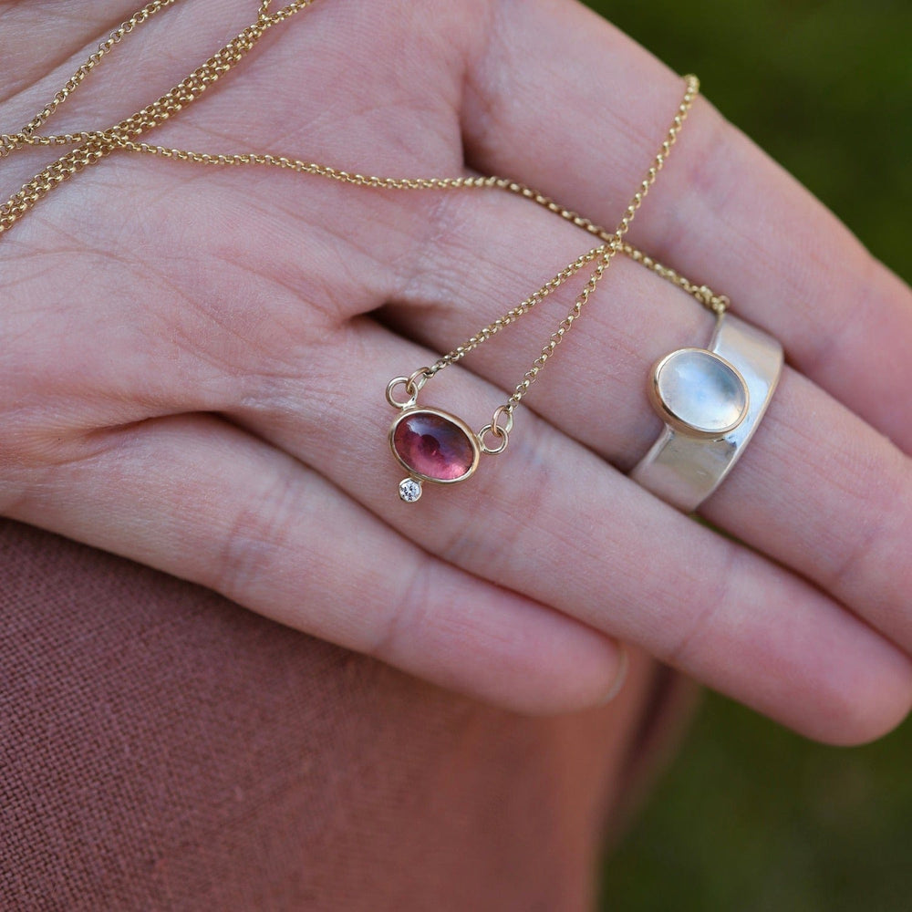 
                      
                        NKL-14K Cosmos Necklace with Pink Tourmaline & White Diamond
                      
                    