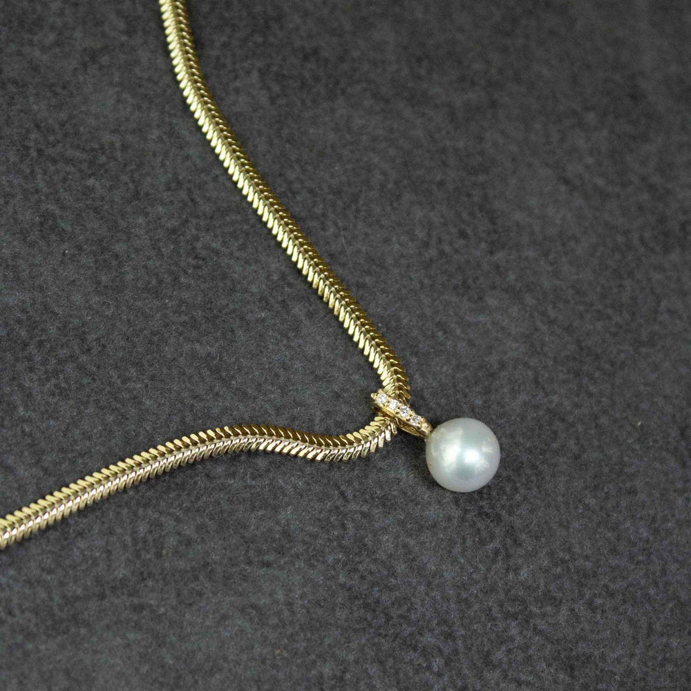 
                      
                        NKL-14K Cultured Pearl Hanging from A White Diamond Pavé Bail Necklace
                      
                    