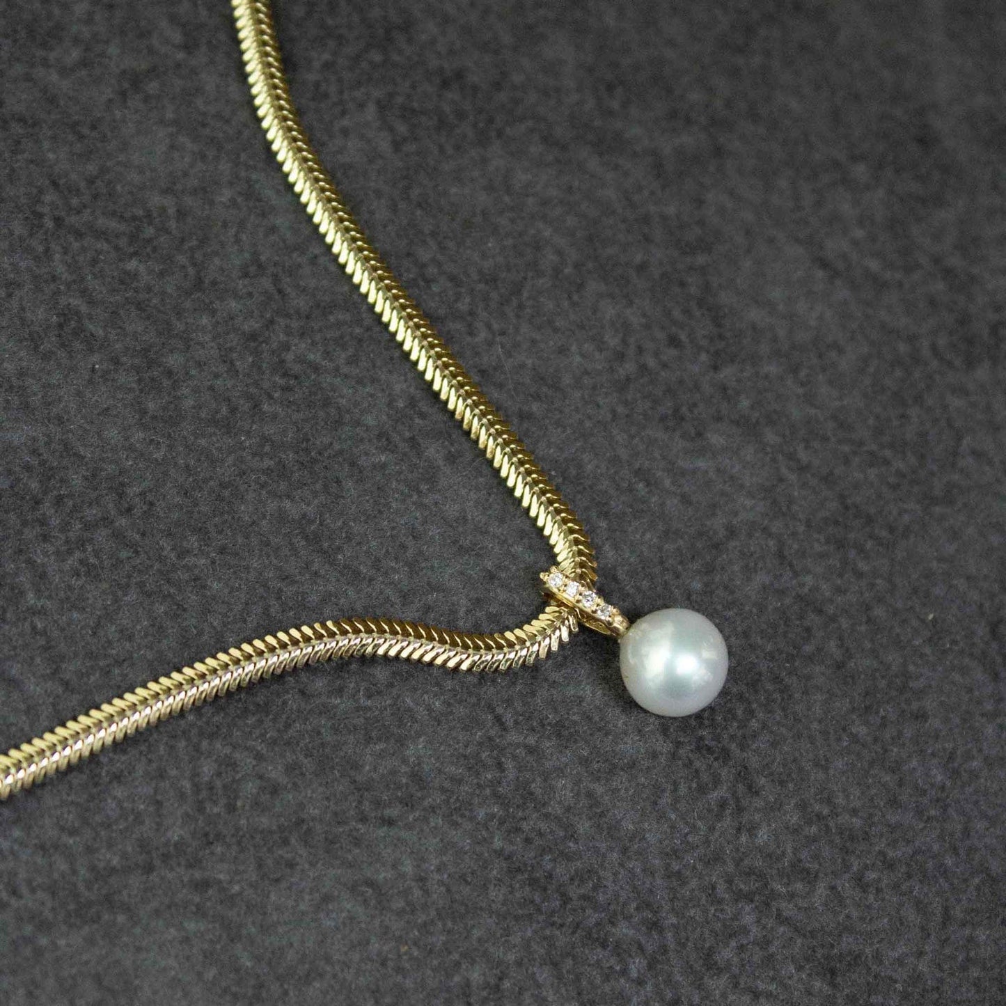 NKL-14K Cultured Pearl Hanging from A White Diamond Pavé Bail Necklace