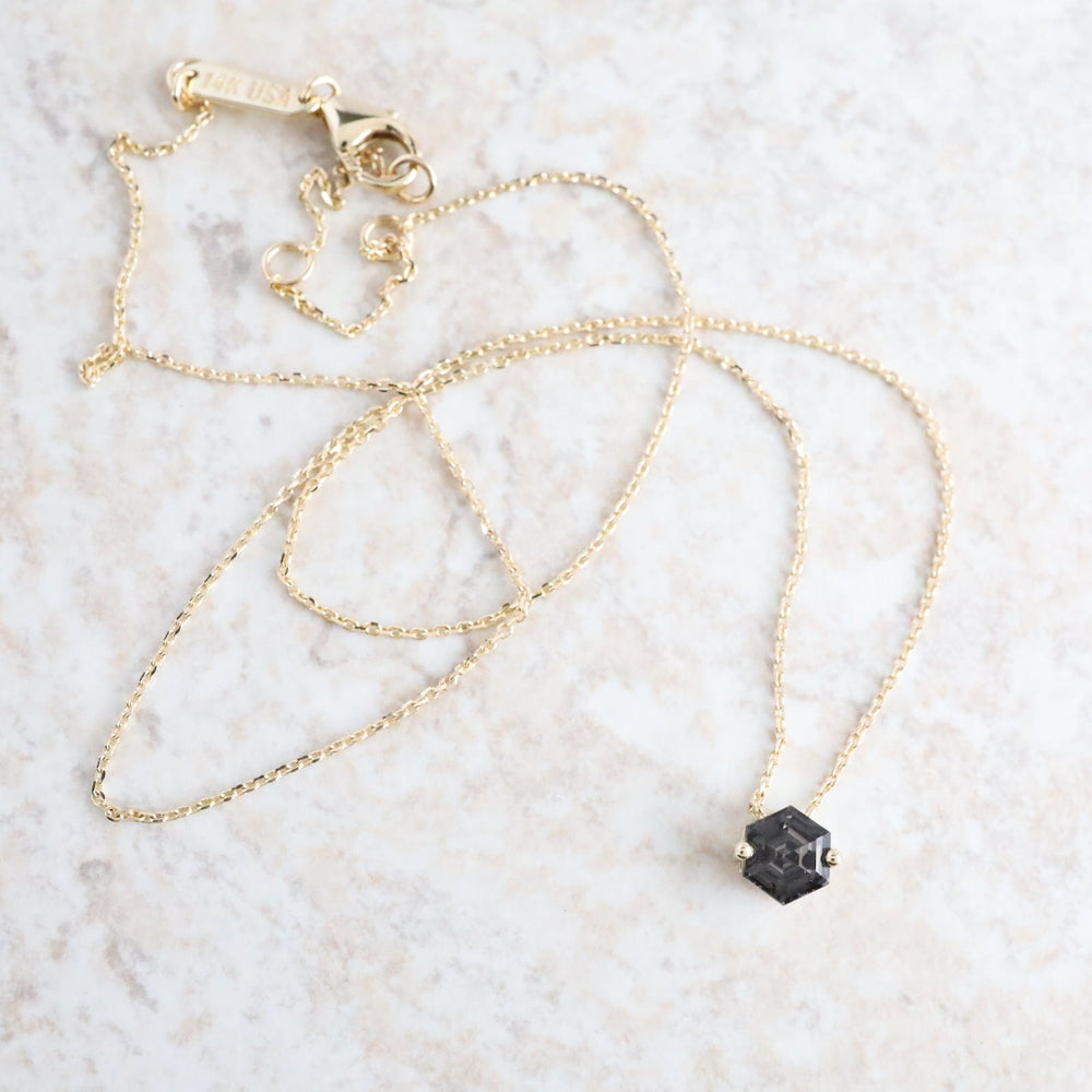 
                  
                    NKL-14K Gold Hexagon Black Night Quartz Necklace
                  
                