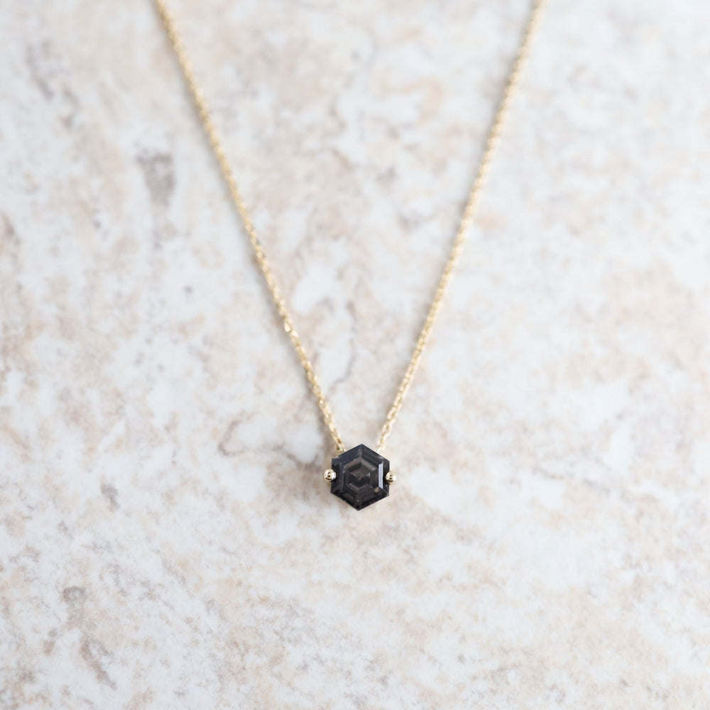 
                  
                    NKL-14K Gold Hexagon Black Night Quartz Necklace
                  
                