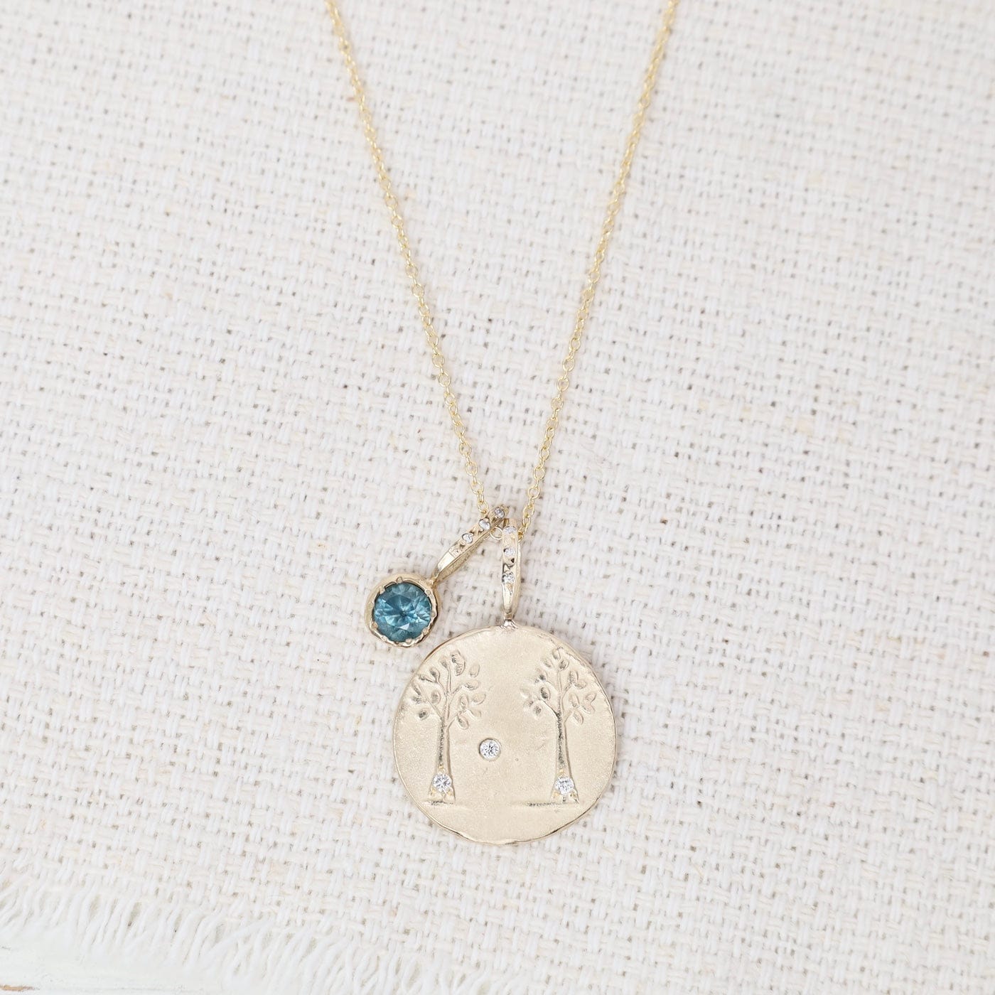 NKL-14K Life Partnership with Montana Sapphire Charm Pendant Necklace
