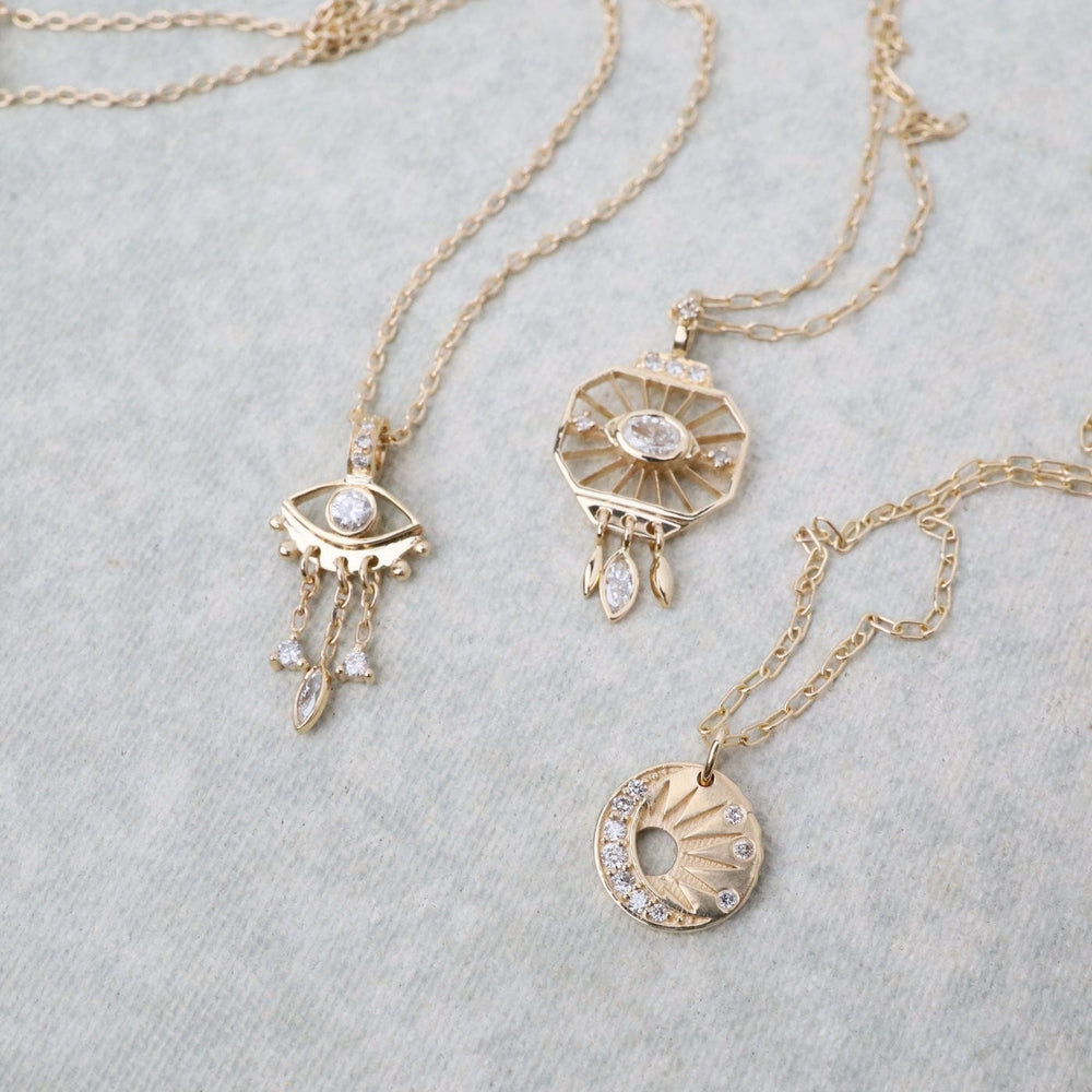 
                  
                    NKL-14K Little Sun & Moon Medal Necklace
                  
                