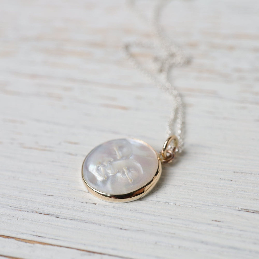 
                      
                        NKL-14K Lunarian Necklace - Mother of Pearl
                      
                    