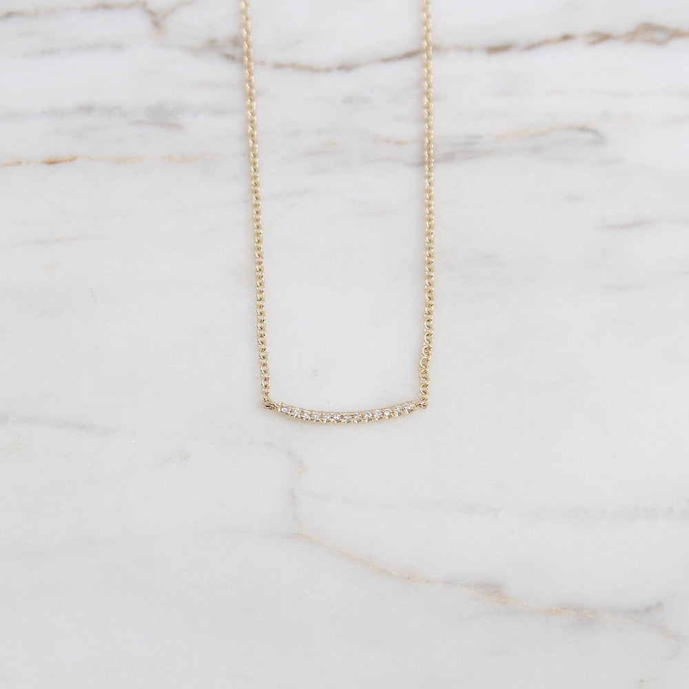 
                      
                        NKL-14K Mini Curved Bar Smile Necklace - 14K Yellow Gold
                      
                    