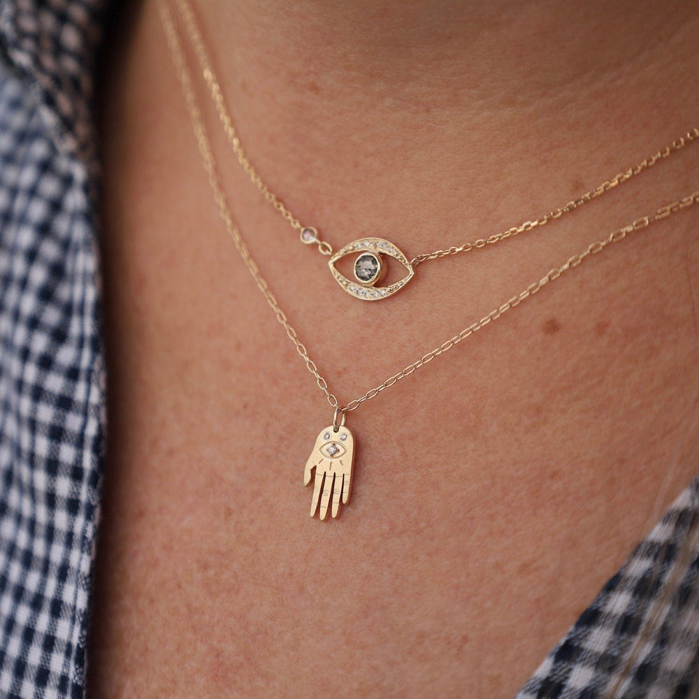 
                      
                        NKL-14K Mini Dharma’s Hand Necklace
                      
                    