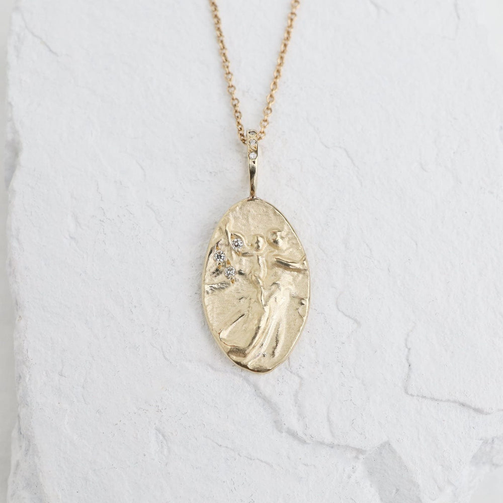 
                      
                        NKL-14K Mother & Child Artifact 14k Gold Necklace
                      
                    