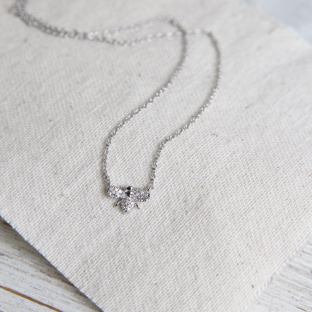 
                      
                        NKL-14K Petite Diamond Bee Necklace - 14K White Gold
                      
                    