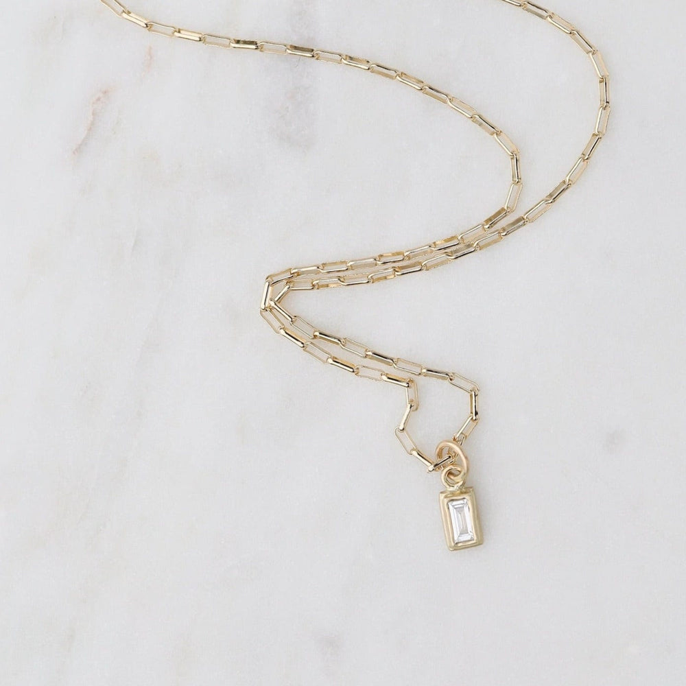 
                      
                        NKL-14K Schoolbook Baguette Diamond Necklace
                      
                    