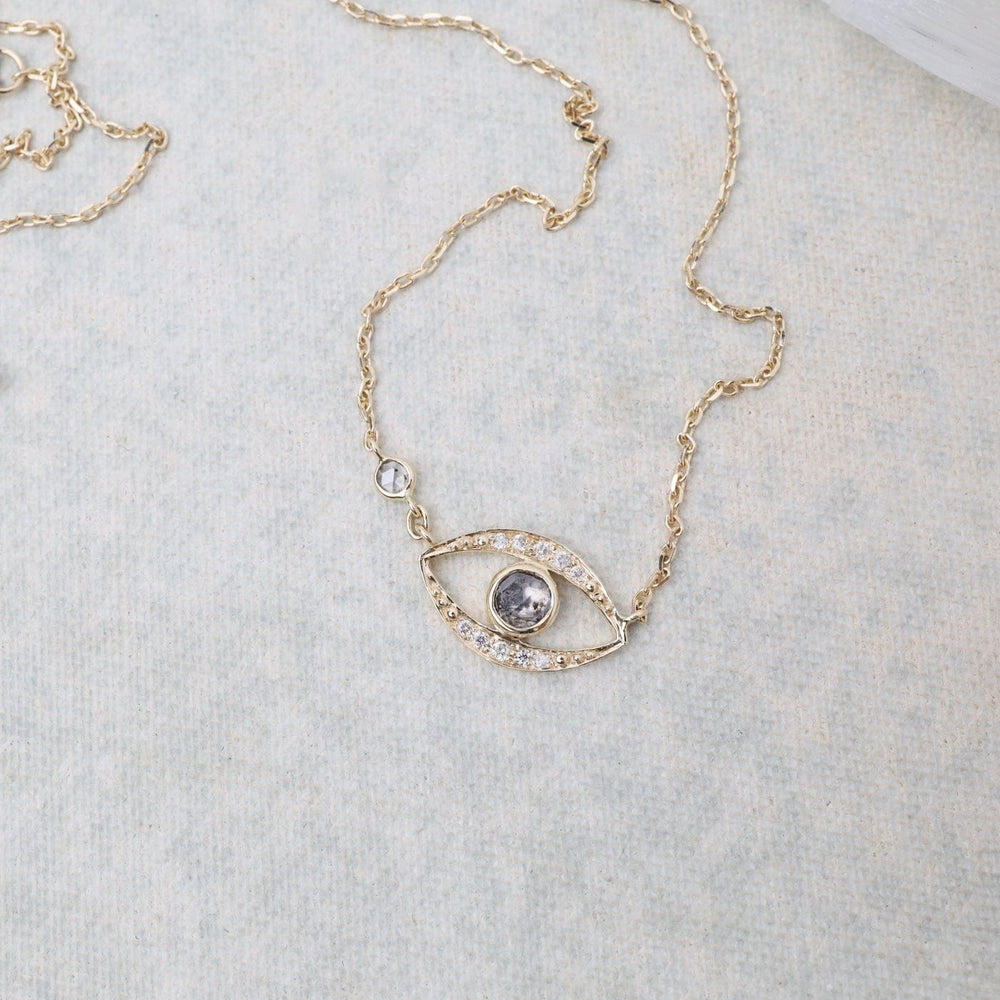 
                      
                        NKL-14K Small Grey Diamond Eye Necklace
                      
                    