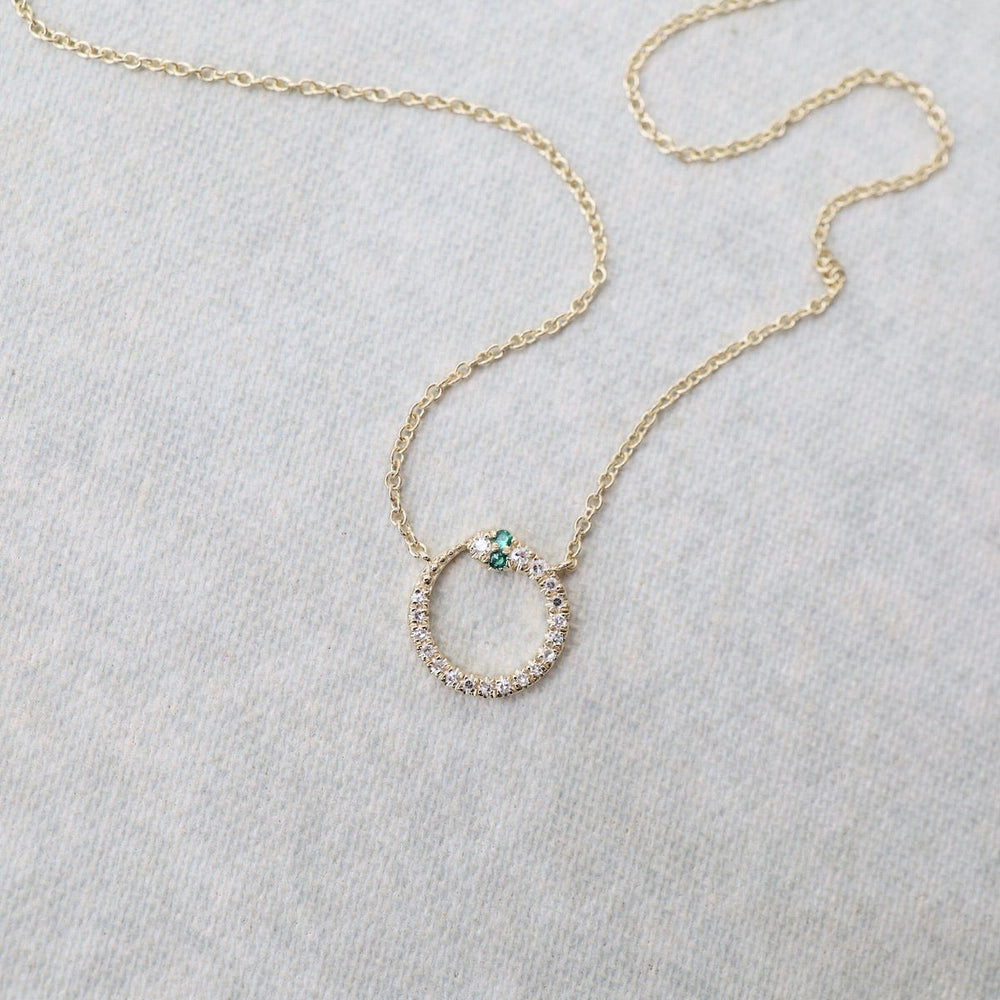 
                  
                    NKL-14K Snake Ouroboros Necklace with Tsavorite Garnets
                  
                