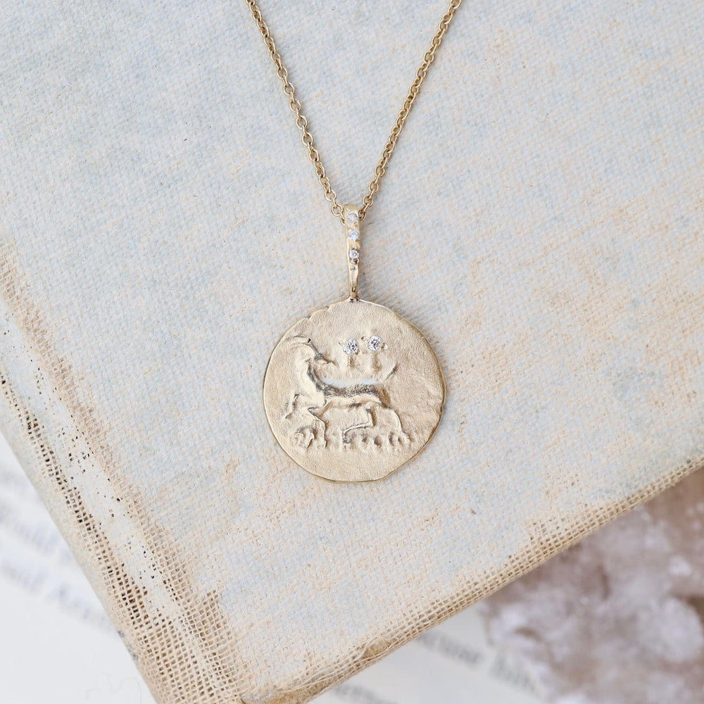 
                      
                        NKL-14K The Goat 14k Gold Necklace
                      
                    