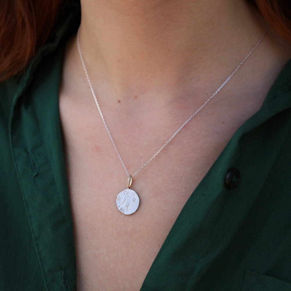 
                      
                        NKL-14K The Light Sterling Silver & 14k Gold Necklace
                      
                    