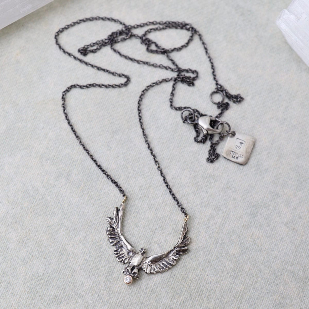 
                      
                        NKL-14K Upward Eagle Silver & 14k Necklace with Diamond
                      
                    