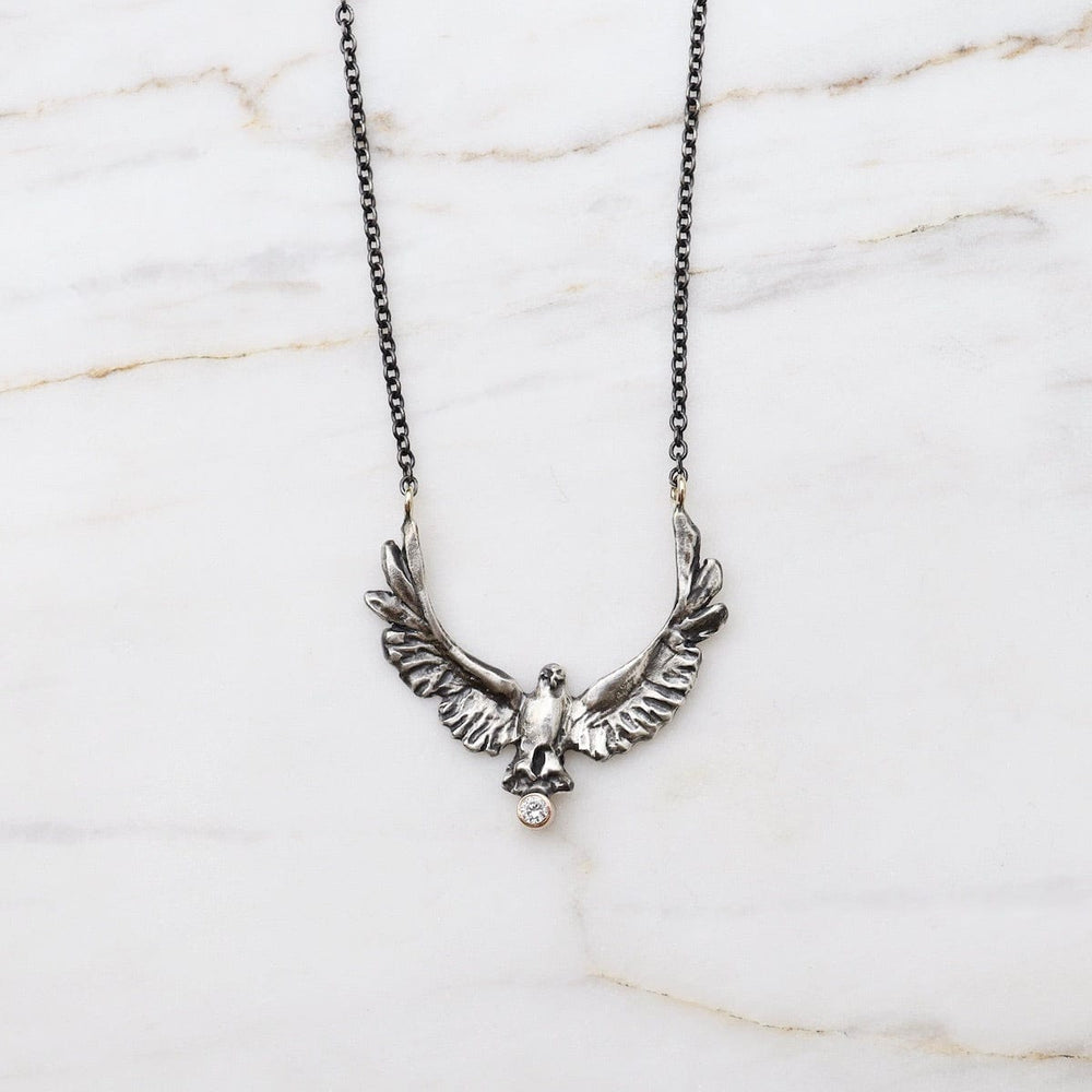 
                      
                        NKL-14K Upward Eagle Silver & 14k Necklace with Diamond
                      
                    