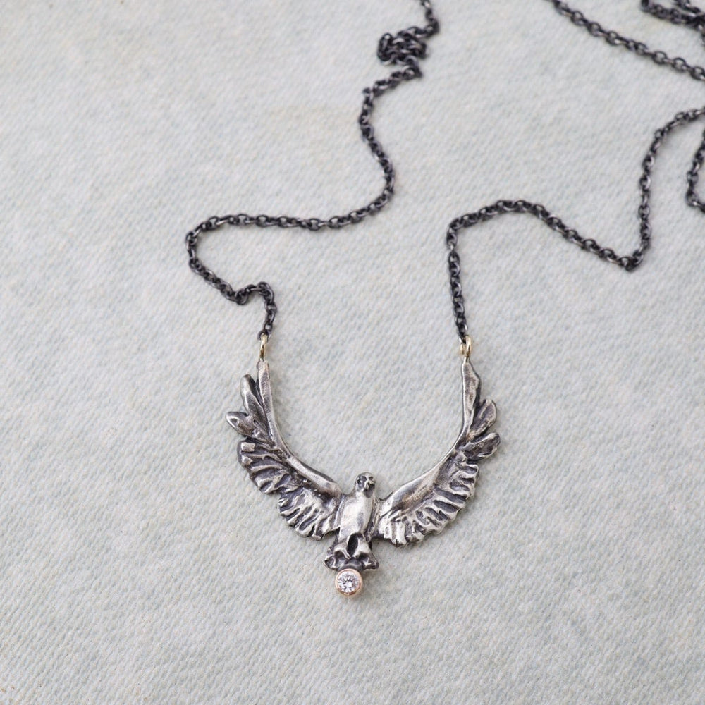 
                      
                        NKL-14K Upward Eagle Silver & 14k Necklace with Diamond
                      
                    