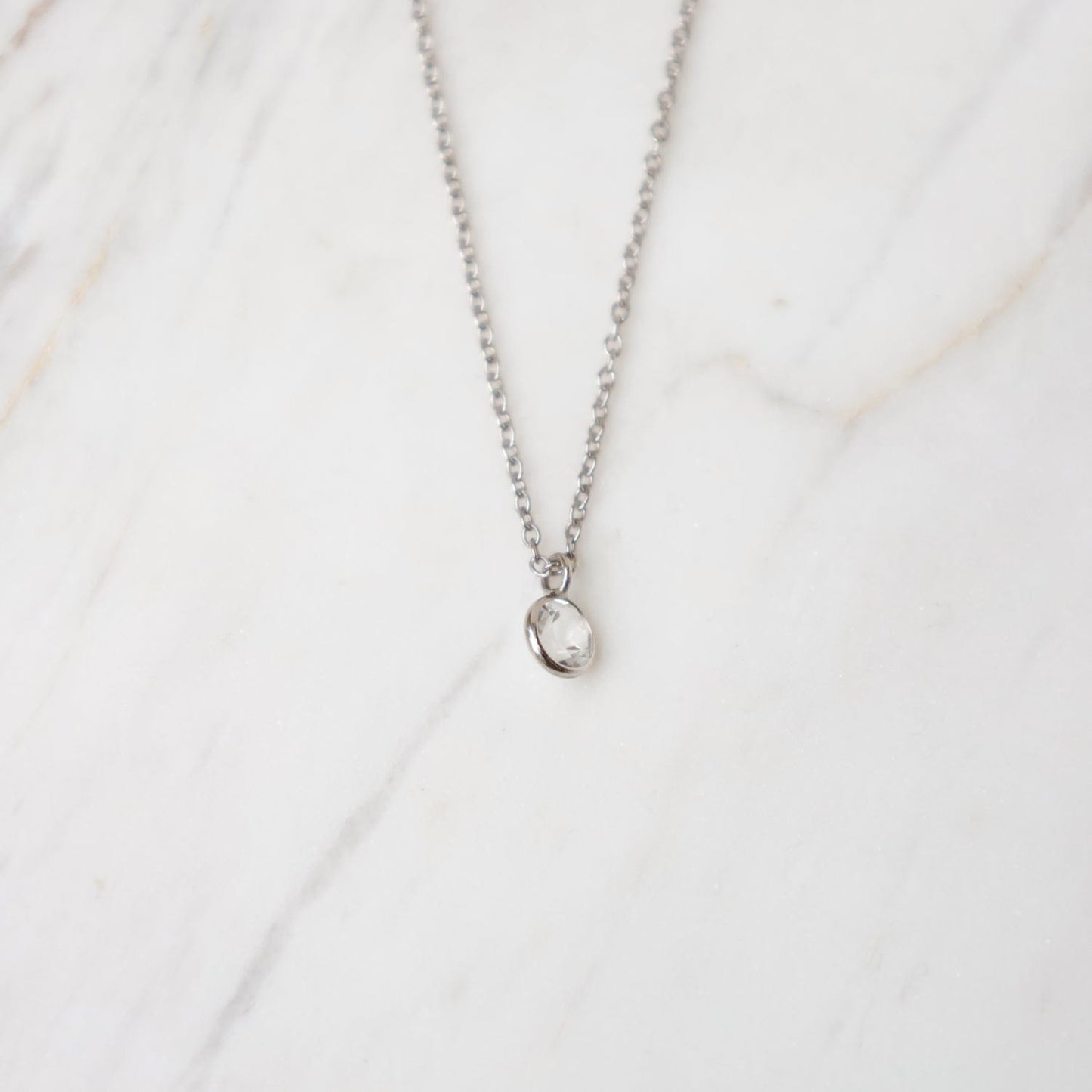 NKL-14K White Gold & White Topaz Solitaire Necklace