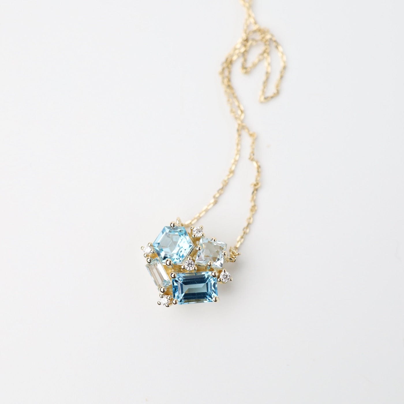 NKL-14K Yellow Gold Blue Cluster Necklace
